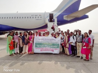 Tribals from Idamalakkudy and kudumbashree staff at airport